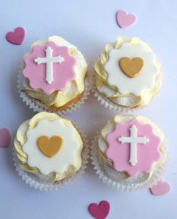 pink cupcakes with cross and heart