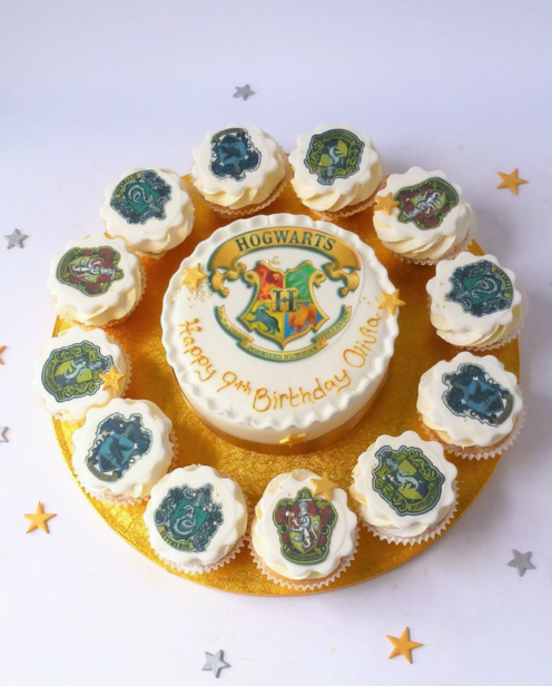 Round cake and cupcakes with Harry Potter Toppers