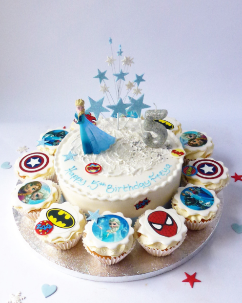 Cake with cupcakes and character toppers