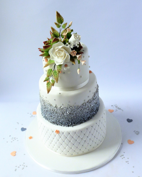 3 tier wedding cake with fondant flower topper