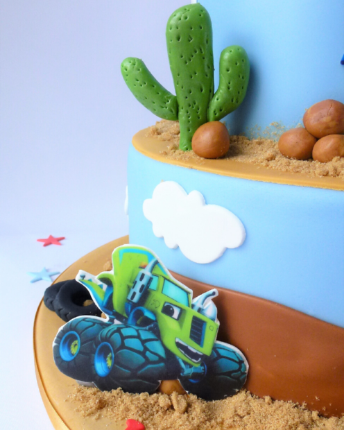 erMonster truck on a birthday cake