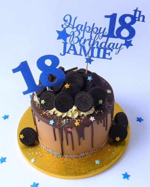 Chocolate birthday cake with topper